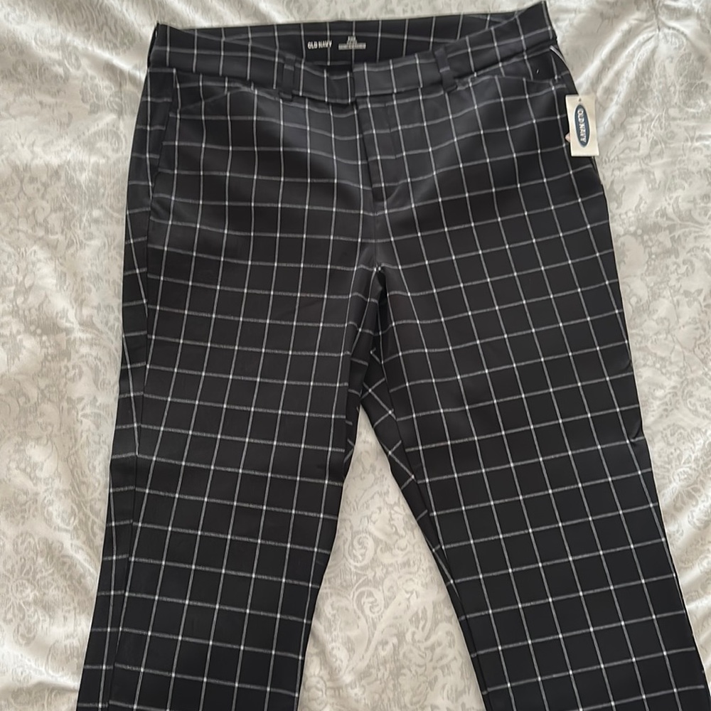 Platted dress slacks. Never worn.